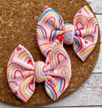 Load image into Gallery viewer, Rainbows and Hearts Piggies Fabric Bows