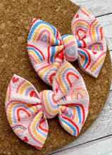 Load image into Gallery viewer, Rainbows and Hearts Piggies Fabric Bows