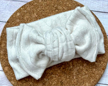 Load image into Gallery viewer, Ivory Cable Knit Sweater Infant Knotted Bow Headwrap
