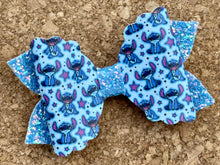 Load image into Gallery viewer, Blue Alien Stars Rainbow Glitter Leatherette Bow
