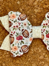 Load image into Gallery viewer, Football Flowers on Cream Layered Leatherette Bow
