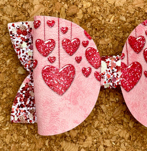 Dripping in Hearts Glitter Leatherette Bow