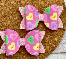 Load image into Gallery viewer, Pink Candy Hearts Glitter Leatherette Piggies Bow
