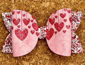 Dripping in Hearts Glitter Leatherette Bow
