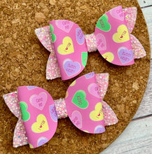 Load image into Gallery viewer, Pink Candy Hearts Glitter Leatherette Piggies Bow
