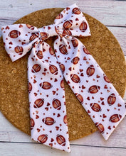 Load image into Gallery viewer, Football Hearts Long Tails Fabric Bow
