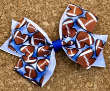 Load image into Gallery viewer, Footballs On Blue Pattern Bow

