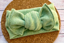 Load image into Gallery viewer, Green Checkered Sweater Knit Infant Knotted Bow Headwrap
