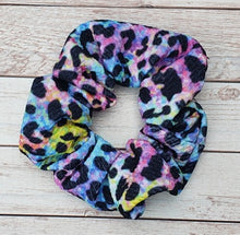 Load image into Gallery viewer, Neon Watercolor Cheetah Scrunchies
