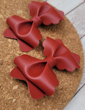 Load image into Gallery viewer, Crimson Butter Layered Leatherette Piggies Bow
