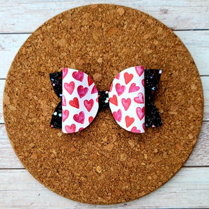 Hearts On Black Glitter Layered Leatherette Bow