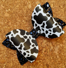 Load image into Gallery viewer, Cow Print Glitter Layered Leatherette Bow
