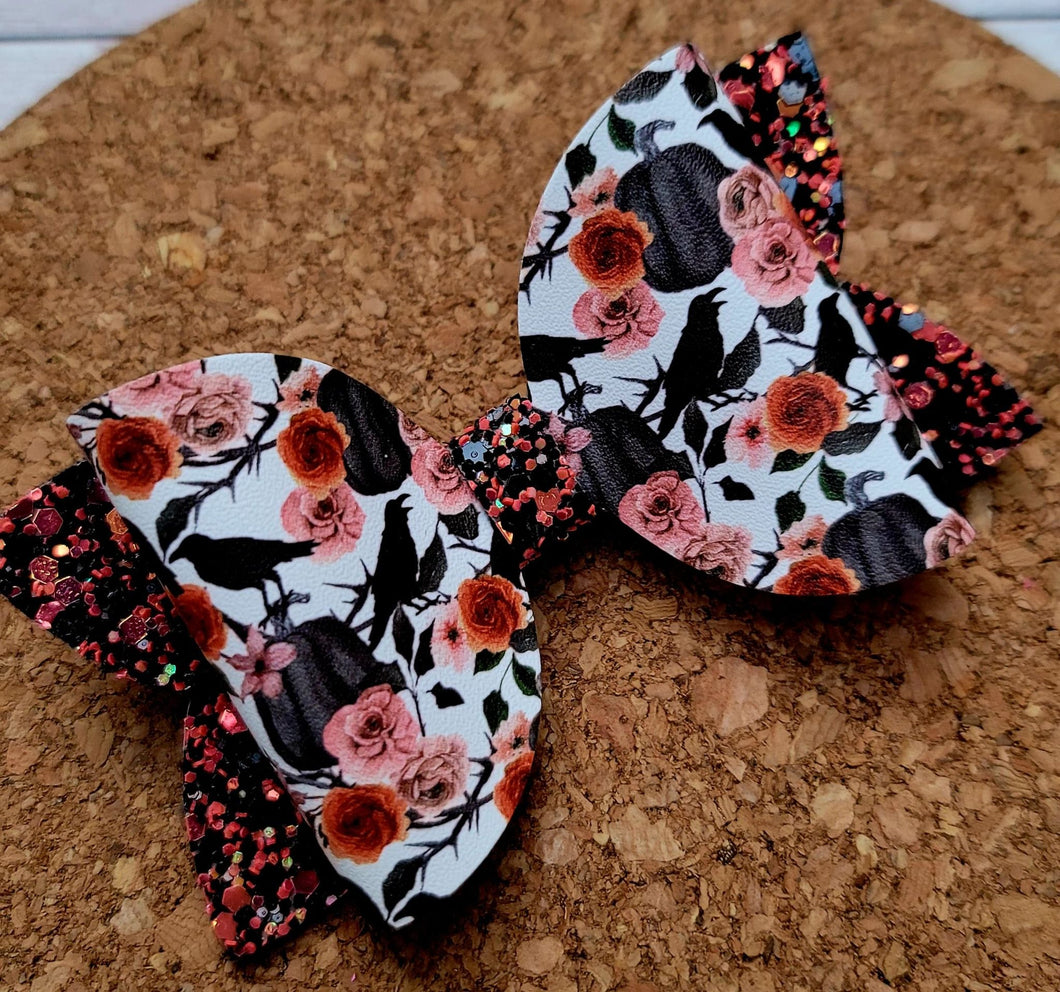 Raven Glitter Layered Leatherette Bow