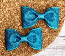 Load image into Gallery viewer, Turquoise Glittered Ribbon Piggies Set

