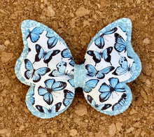 Load image into Gallery viewer, Blue Butterfly Glitter Layered Leatherette Bow
