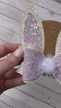 Load and play video in Gallery viewer, Bunny Ears Pearl Lavender Glitter Layered Coco Leatherette Bow

